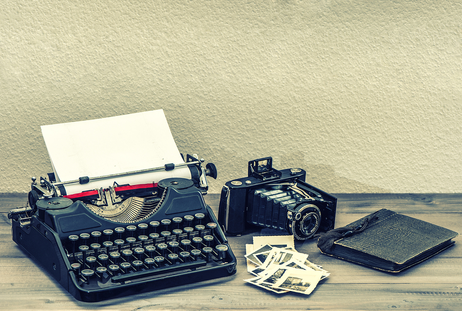 Antique Typewriter And Vintage Photo Camera