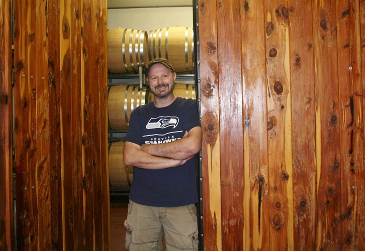 Tim Drake, winemaker at Flat Creek Estate, in the barrel room